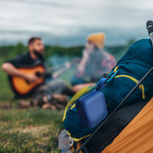 Pursonic Adventure Power & Sound Bundle with portable solar power bank and 360° wireless speaker, perfect for outdoor use.