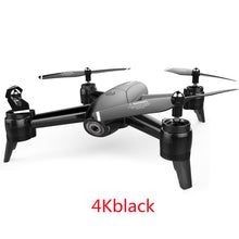 Dolphin Tracker aerial drone with RFID for lost recovery, flying outdoors over a scenic landscape.