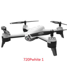 Dolphin Tracker aerial drone with RFID technology for aerial surveillance and lost item recovery, flying over landscape.