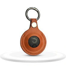 Dolphin Smart Bluetooth Tracker Pro with case, versatile key finder device, showing sleek design and replaceable battery compartment.