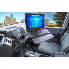 Techsconnect full-motion lockable car laptop mount holding 12 to 15.4-inch laptops securely in a vehicle.