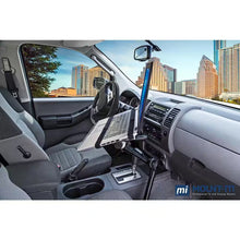 Techsconnect full-motion lockable car laptop mount for 12 to 15.4-inch laptops, showing adjustable arms and secure locking mechanism.