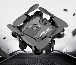 Mini folding drone by Dolphin Tracker with RFID for compact aerial photography and easy portability.