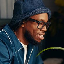 Ray-Ban Wayfarer smart glasses by techsconnect with shiny black finish, green lenses, large fit, featuring AI, audio, photo, and video functions.