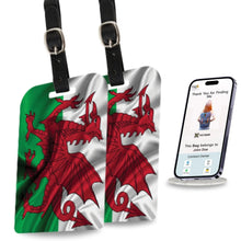 Two Wales flag smart bag security tags by Global Lost Recovery Service, designed for luggage security at airports.