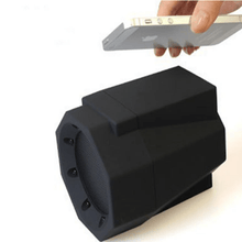 Dolphin Tracker magnetic induction resonance speaker showcasing sleek design and advanced wireless audio technology.