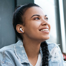 Wireless sports gaming Bluetooth headset by Dolphin Tracker with RFID for lost recovery, featuring over-ear design and adjustable headband.